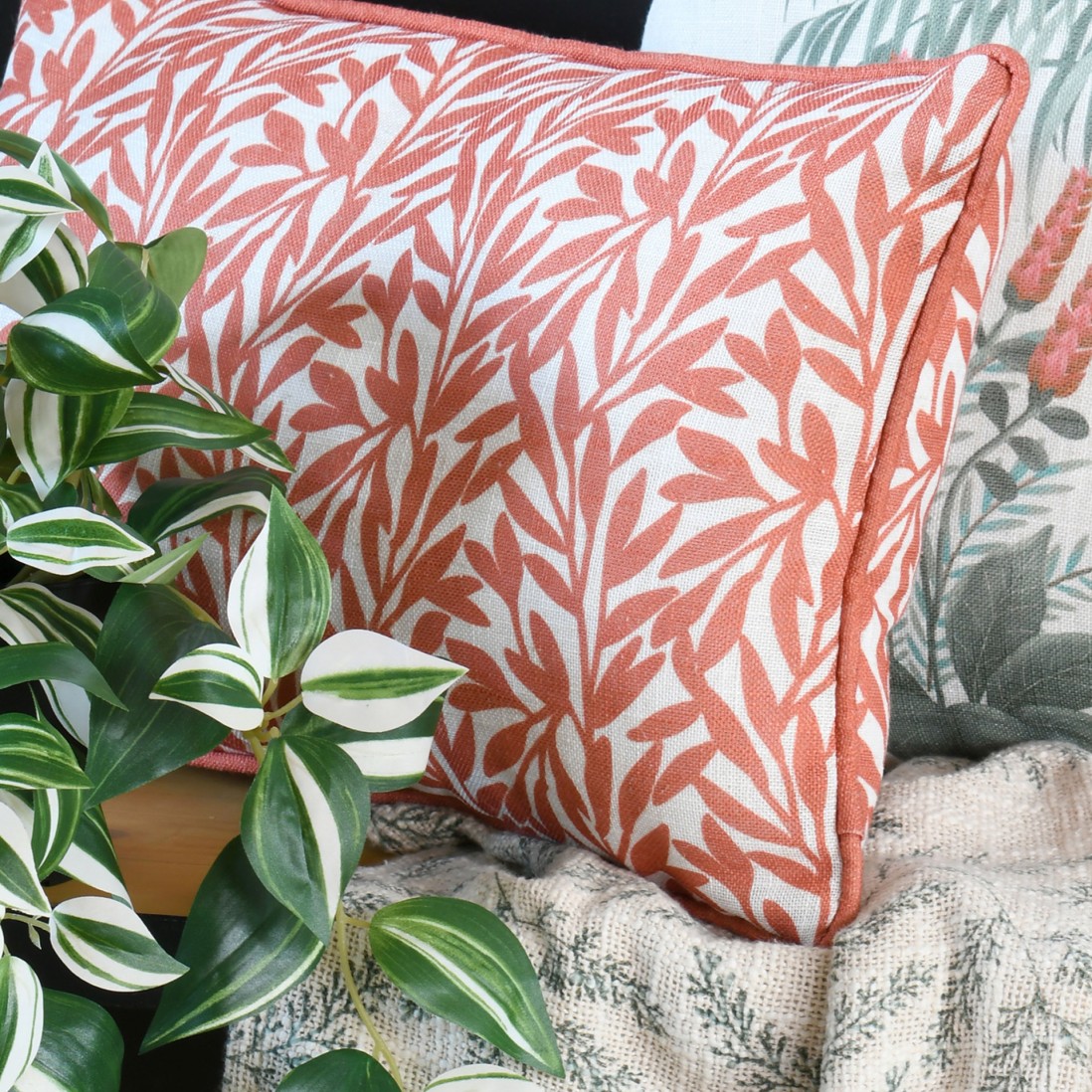 Antillia orange terracotta cushion with floral pattern 30 x 50 cm