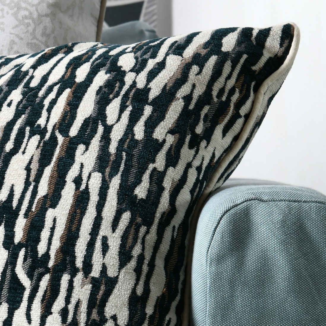 Denali 001 cushion in chenille with abstract petrol blue/ivory design 45 x 45 cm