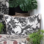 Sapajou cushion black double-sided with monkey and leaf design 50 x 50 cm