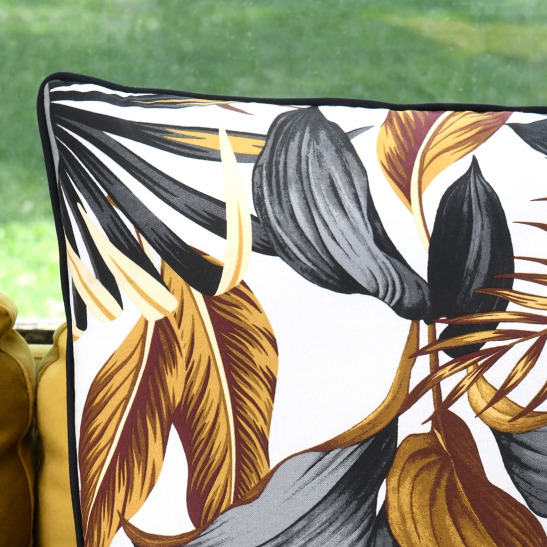 Ouvea cotton cushion with floral pattern and black piping 60 x 60 cm
