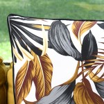 Ouvea cotton cushion with floral pattern and black piping 60 x 60 cm