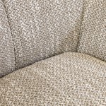 Drava swivel armchair in beige chenille