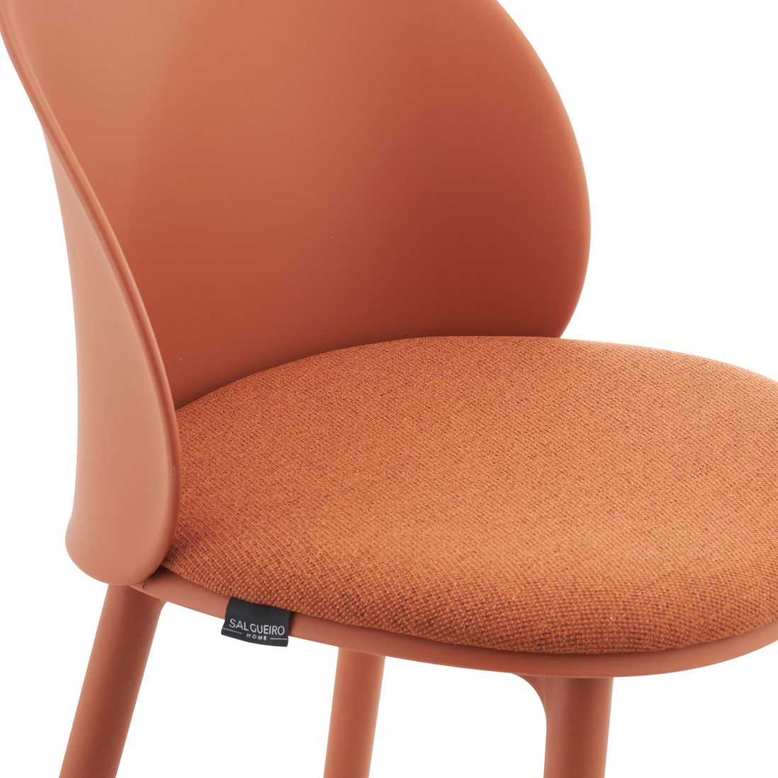 Stella orange polypropylene chair with cushioned seat