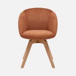 Allos chair orange fabric swivel and nordic style legs in solid beech wood with a natural finish