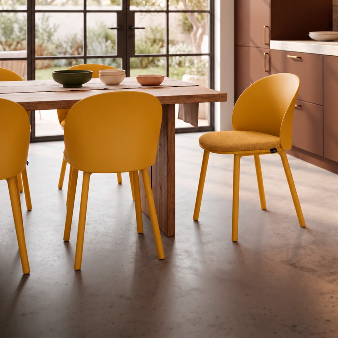 Stella yellow polypropylene chair with cushioned seat